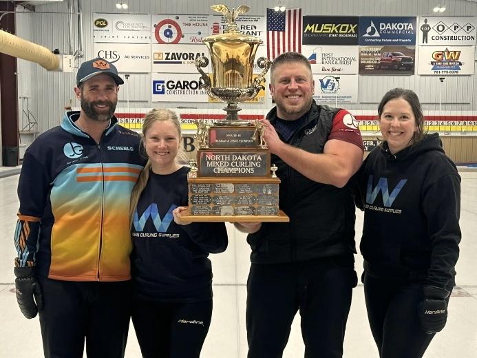 A group of people standing togetherDescription automatically generated